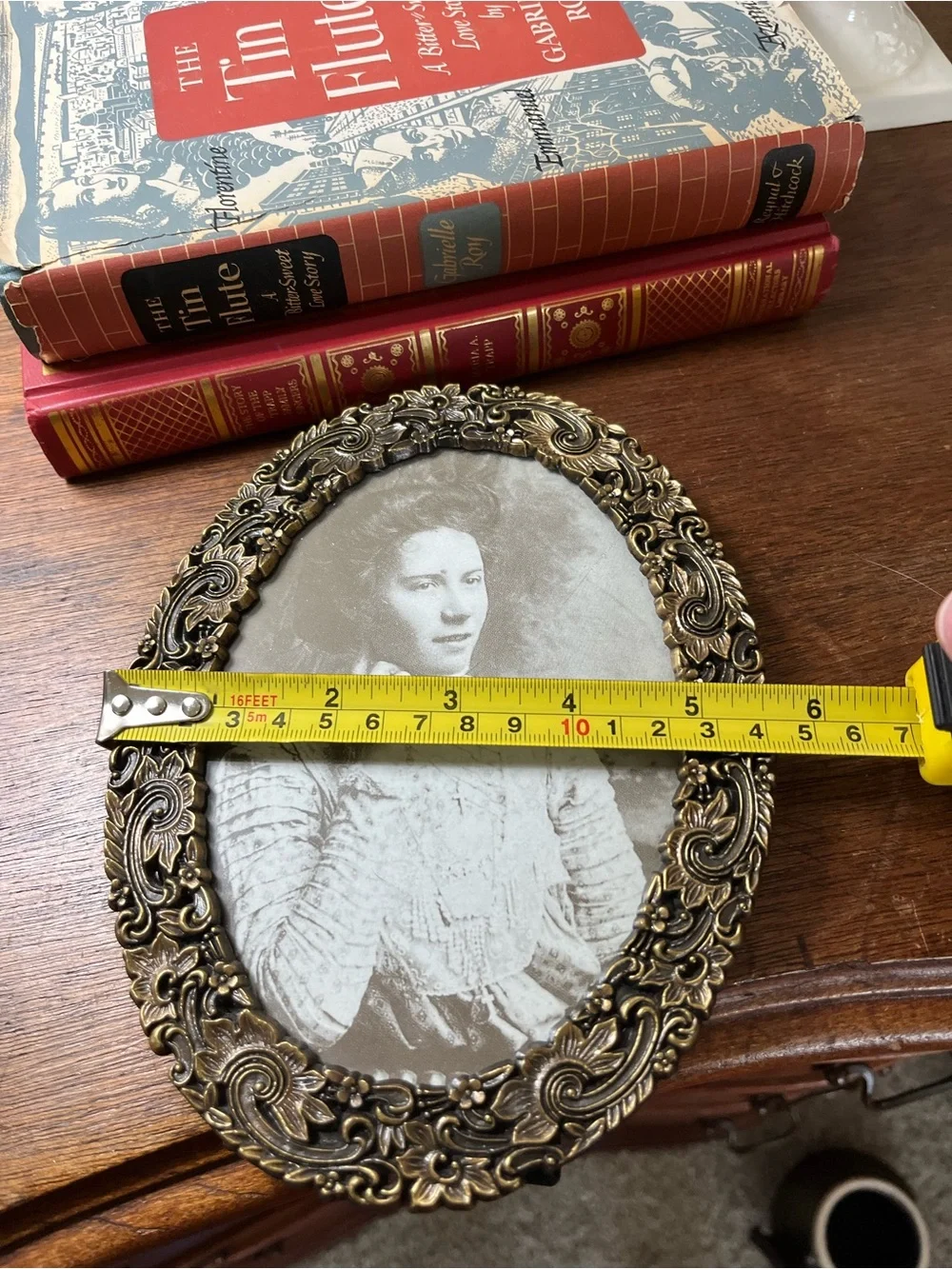 Vintage brass frame with black and white portrait